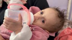Baby followed by BBC back in Gaza hospital after treatment abroad
